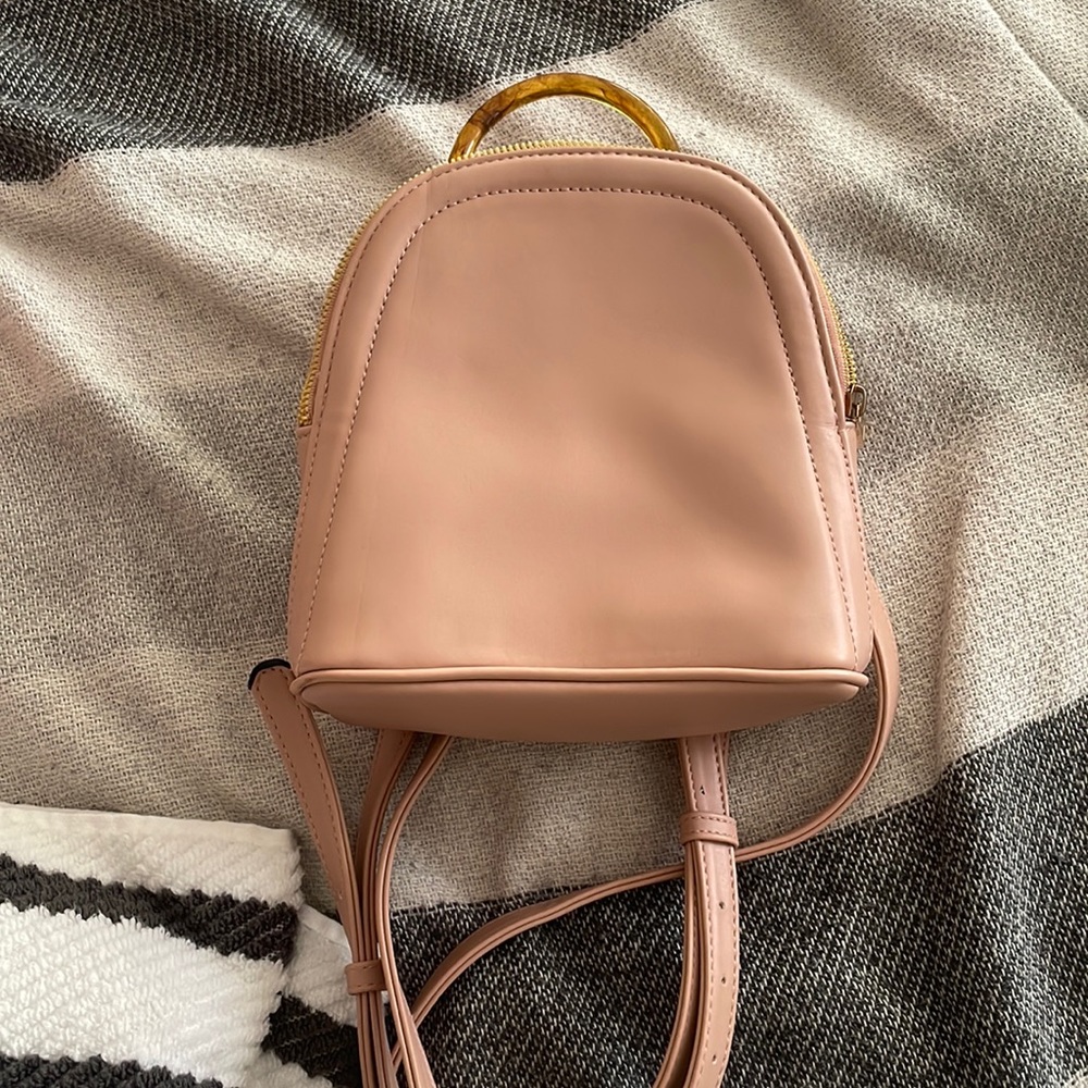 A New day mini backpack